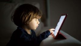  A child looking at a screen